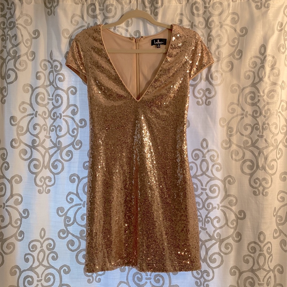 Never worn! Gold, sparkly, fitted dress (great for New Year’s Eve!)